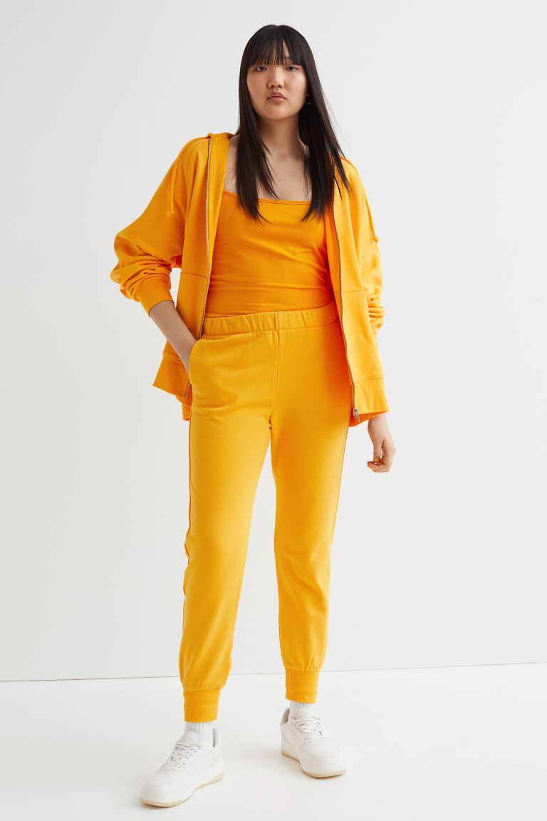 Cliomakeup-pantaloni-2022-hm-Joggers-gialli