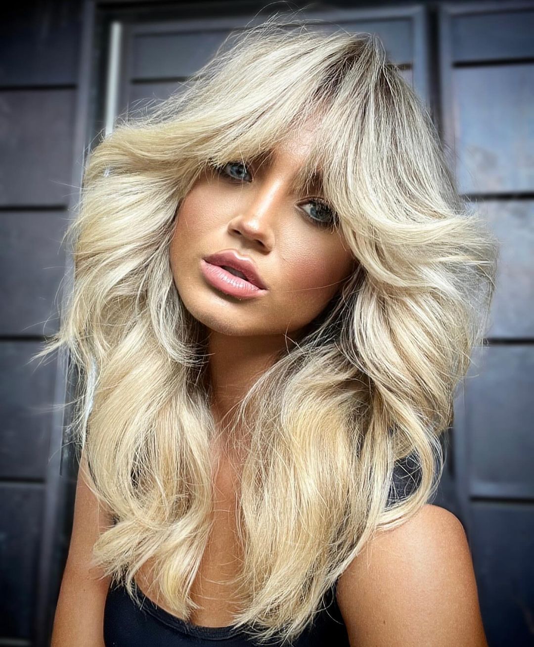 tagli-capelli-lunghi-autunno-2024-scalati-sfilati