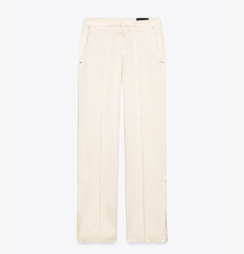 pantaloni-bianchi-zara-primavera-2025-inserti-pizzo