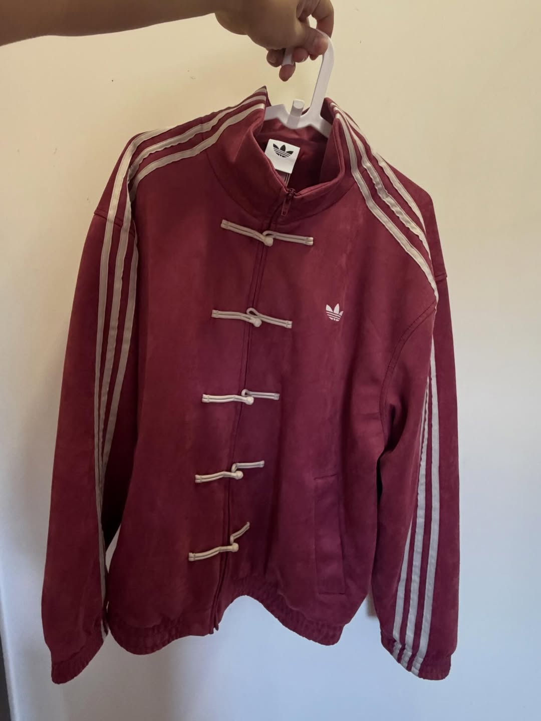 giacca-virale-adidas-salmone