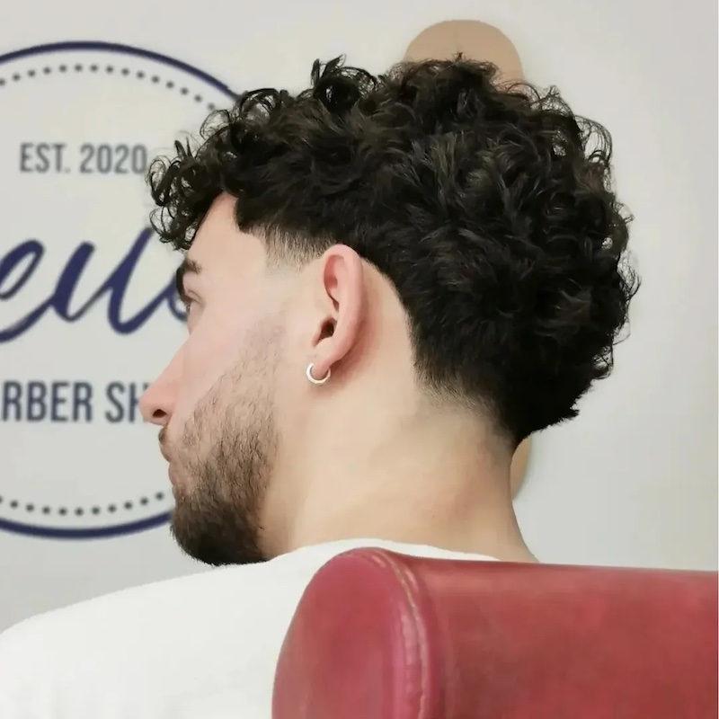 tagli-capelli-corti-uomo-law-ricci